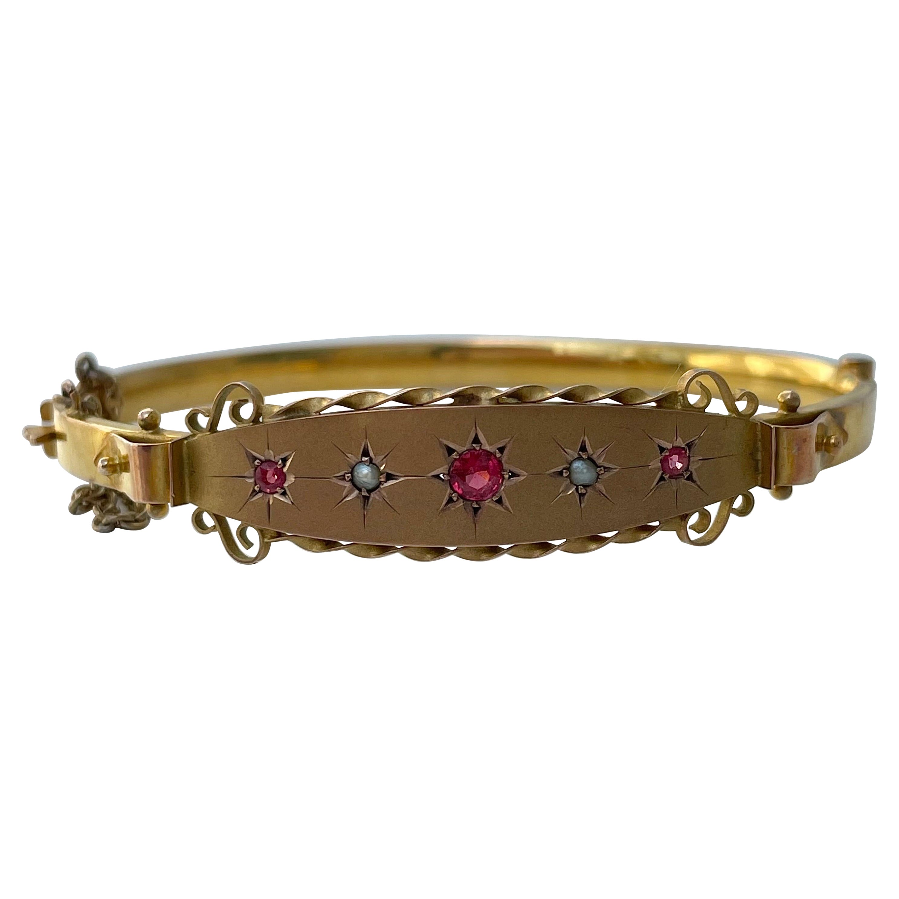 Bracelet jonc étoile ancien en or avec grenats et perles  en vente
