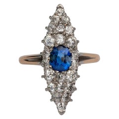 Antique 2.25ctw Blue Sapphire and Old Mine Cut Diamond Pave Gold & Platinum Navette Ring