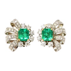 Pair of Emerald and Diamond Clip on Earrings in Platinum, Circa 1940