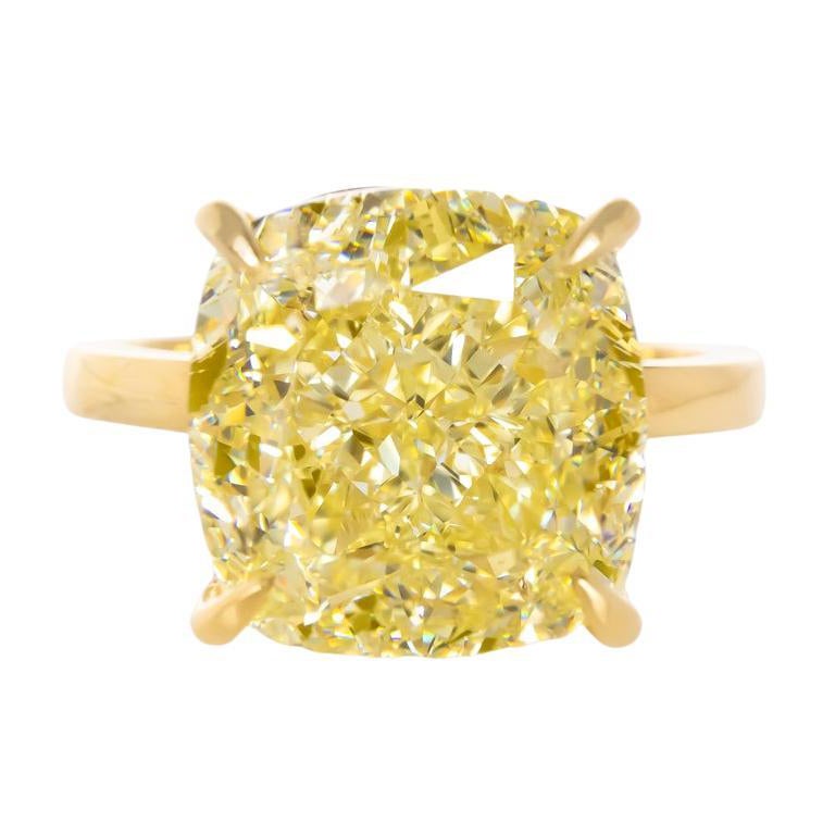GIA Certified 7 Carat Fancy Yellow Cushion Cut Diamond 18 Carats Gold Ring
