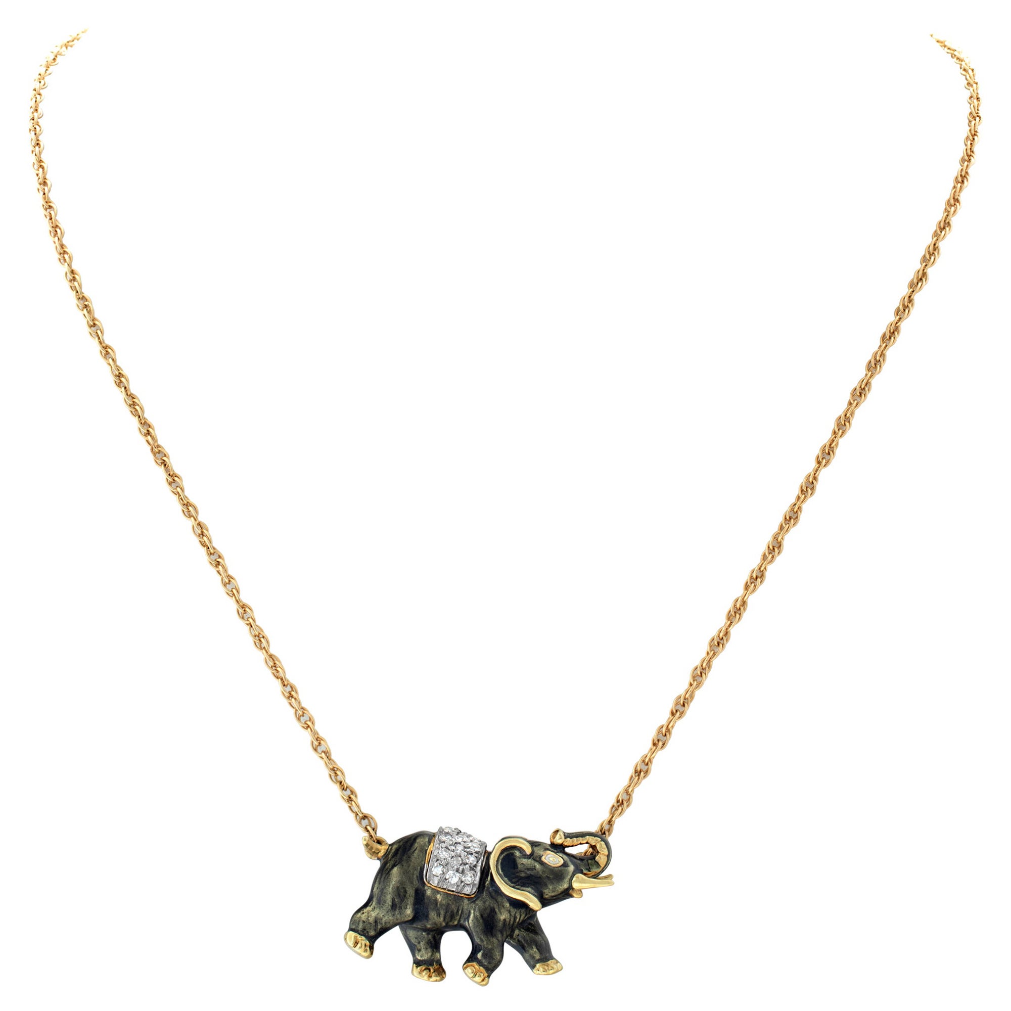 Elephant necklace in 14k gold with 0.25 carats in diamond accents G-H color For Sale