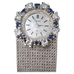 Seiko Damenuhr, 14 Karat Weißgold Diamant & Saphir