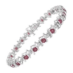 Sterling Silver Lab-Grown Gemstone and 1/6 Carat Round Diamond Tennis Bracelet