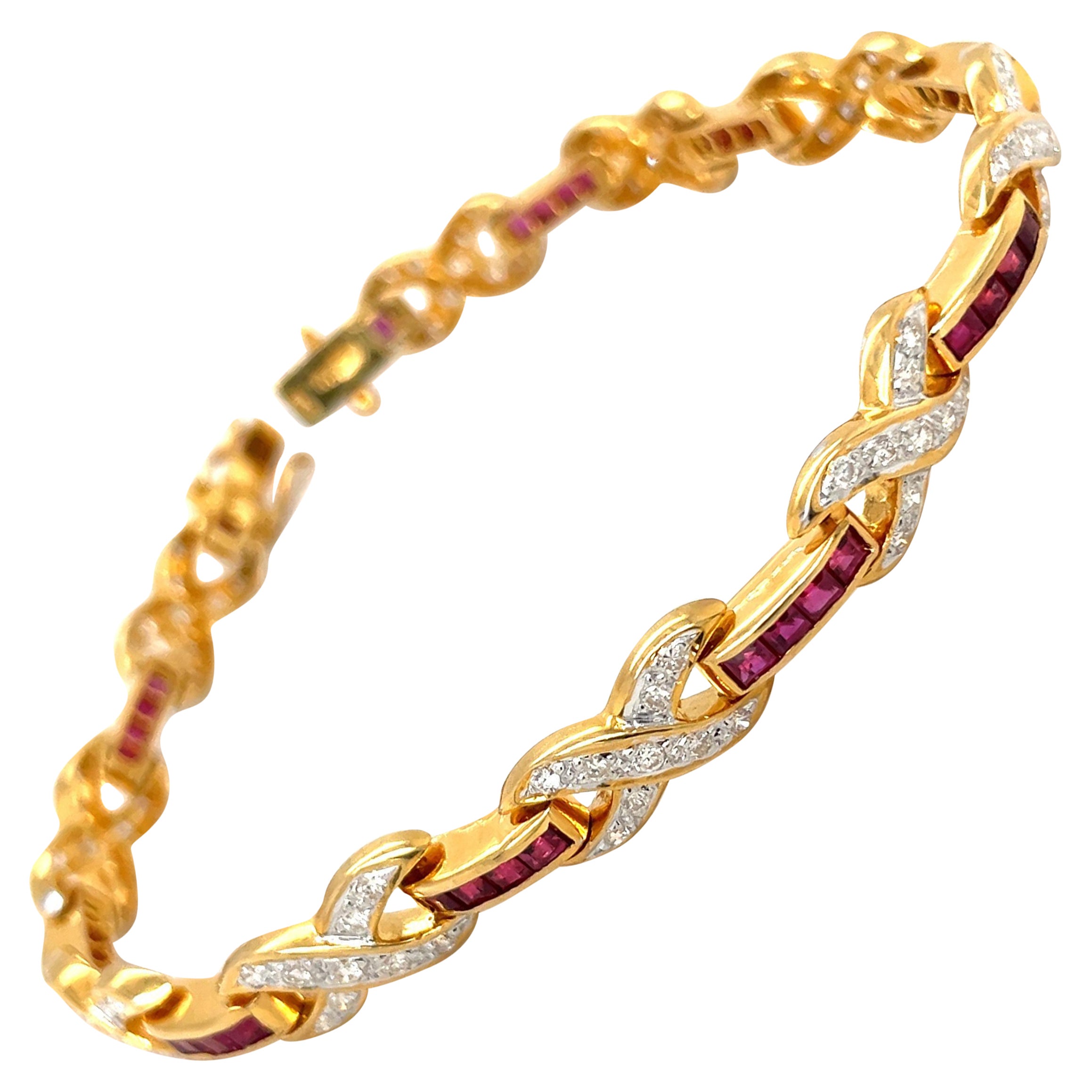 18 Karat Yellow Gold Diamond Infinity Motif and Invisibly Set Ruby Bracelet