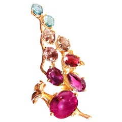 Collier pendentif en or rose dix-huit carats rubis rose rubellite grenat malaya