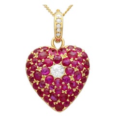 Antique 2.80 Carat Ruby and 0.28 Carat Diamond Yellow Gold Heart Pendant Locket