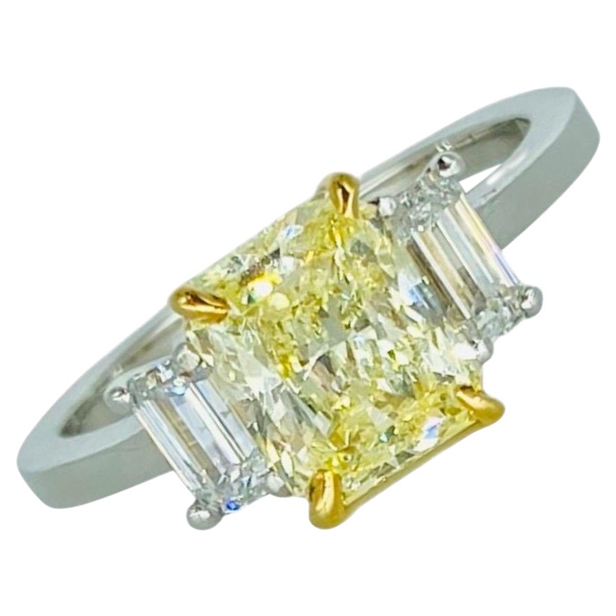 GIA Certified 2.46 Carat Natural Fancy Yellow Diamond Engagement Ring Platinum For Sale