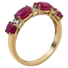 Gemistry 2.55 Ct. T.W. Ruby Band Ring with Diamonds in 14k Yellow Gold