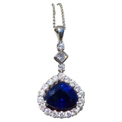 Pear Shaped Sapphire and Diamond Pendant in 18K White Gold