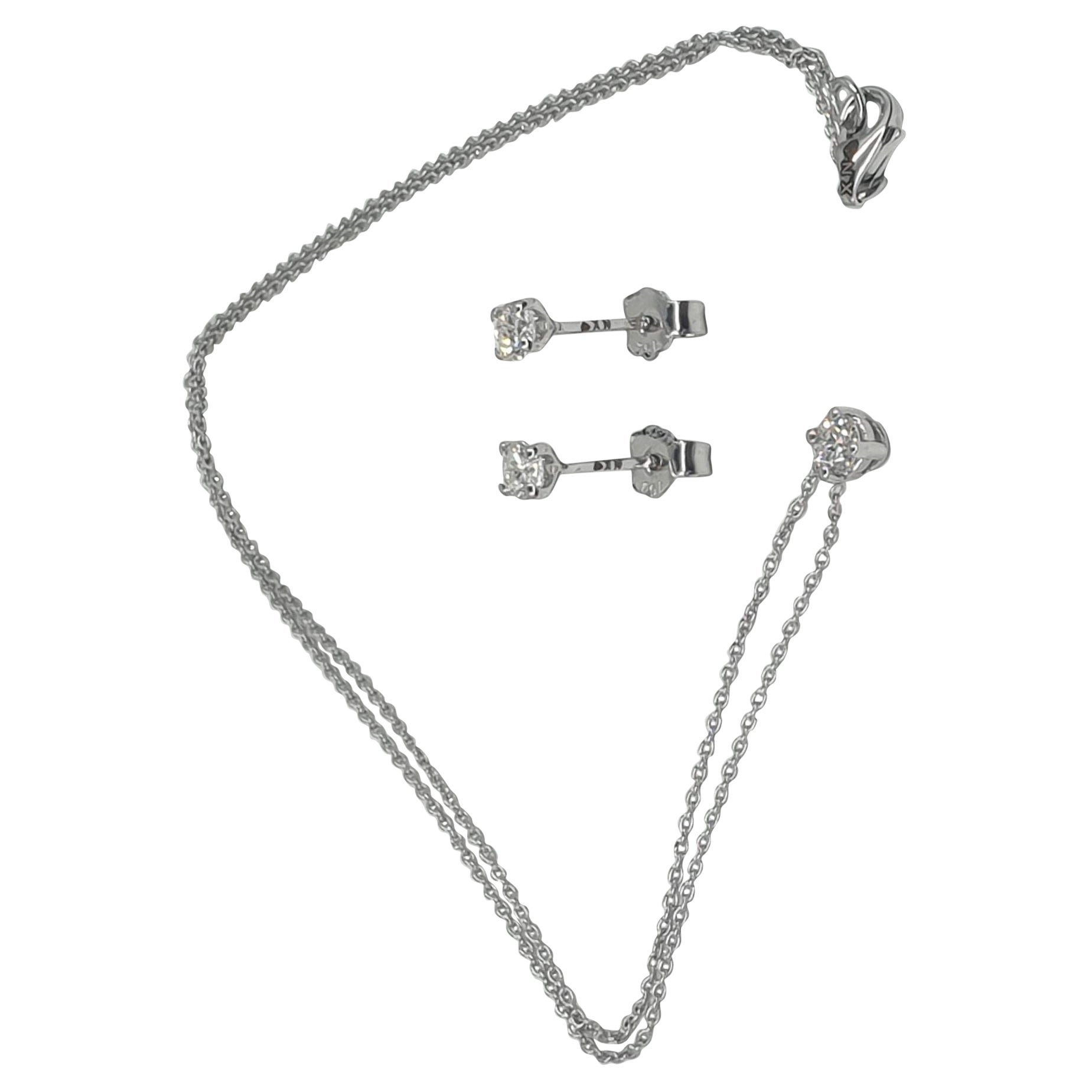 Boucles d'oreilles et collier solitaires en diamants certifiés GIA de 0,63 carat G/SI1 en vente