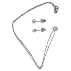 Boucles d'oreilles et collier solitaires en diamants certifiés GIA de 0,63 carat G/SI1
