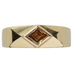 18 Carat Gold Ring Bezel Set with a Brown Kite Shape Diamond