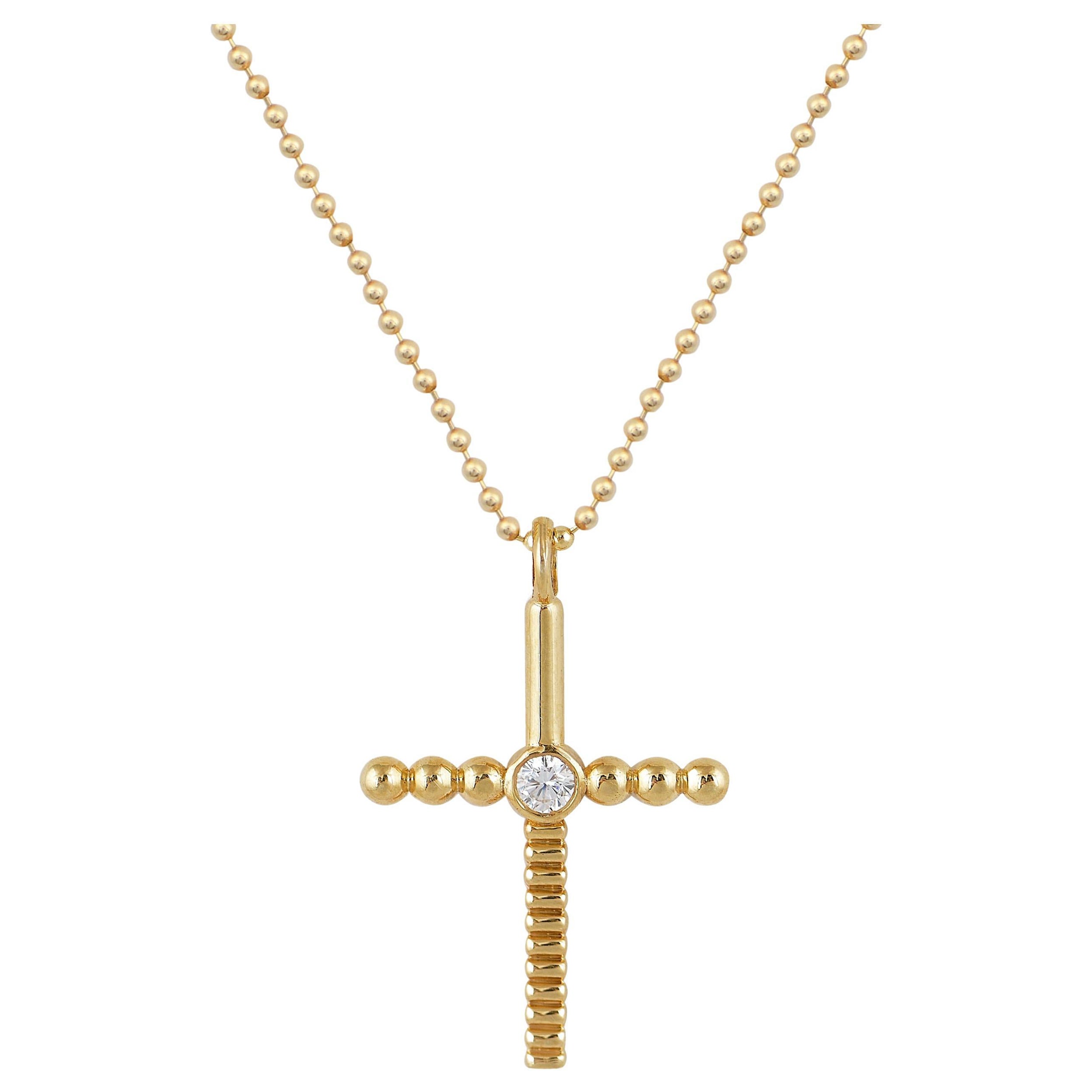 Pendentif croix interchangeable en or jaune 18 carats avec un diamant