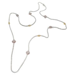 Throw-On Long Thin Diamond Tennis Necklace with Diamond Motifs in 18 Karat Gold