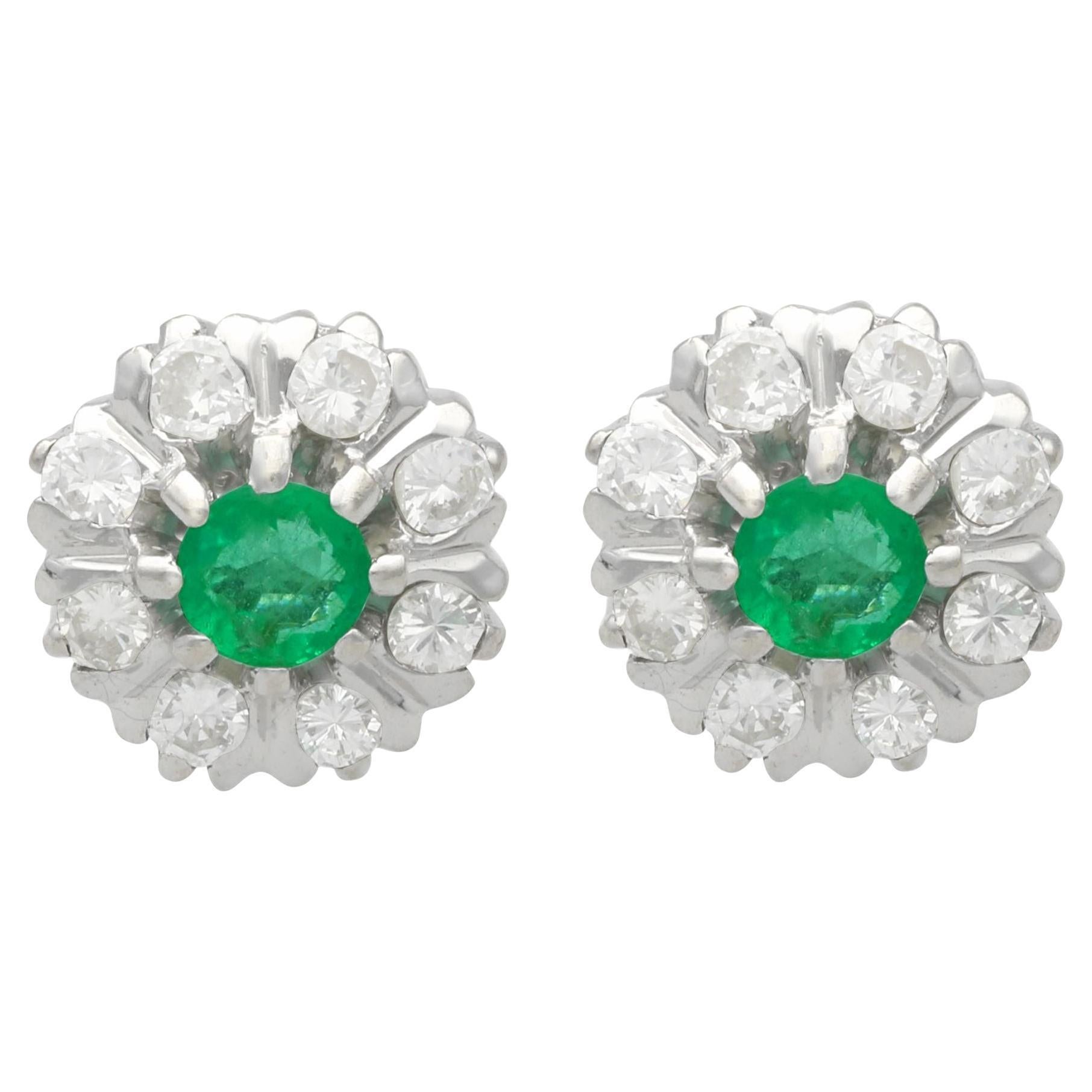 Vintage 0.56 Carat Emerald and 0.65 Carat Diamond White Gold Cluster Earrings For Sale