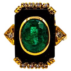 Art Deco Style White Diamond Oval Cut Emerald Onyx Yellow Gold Cocktail Ring