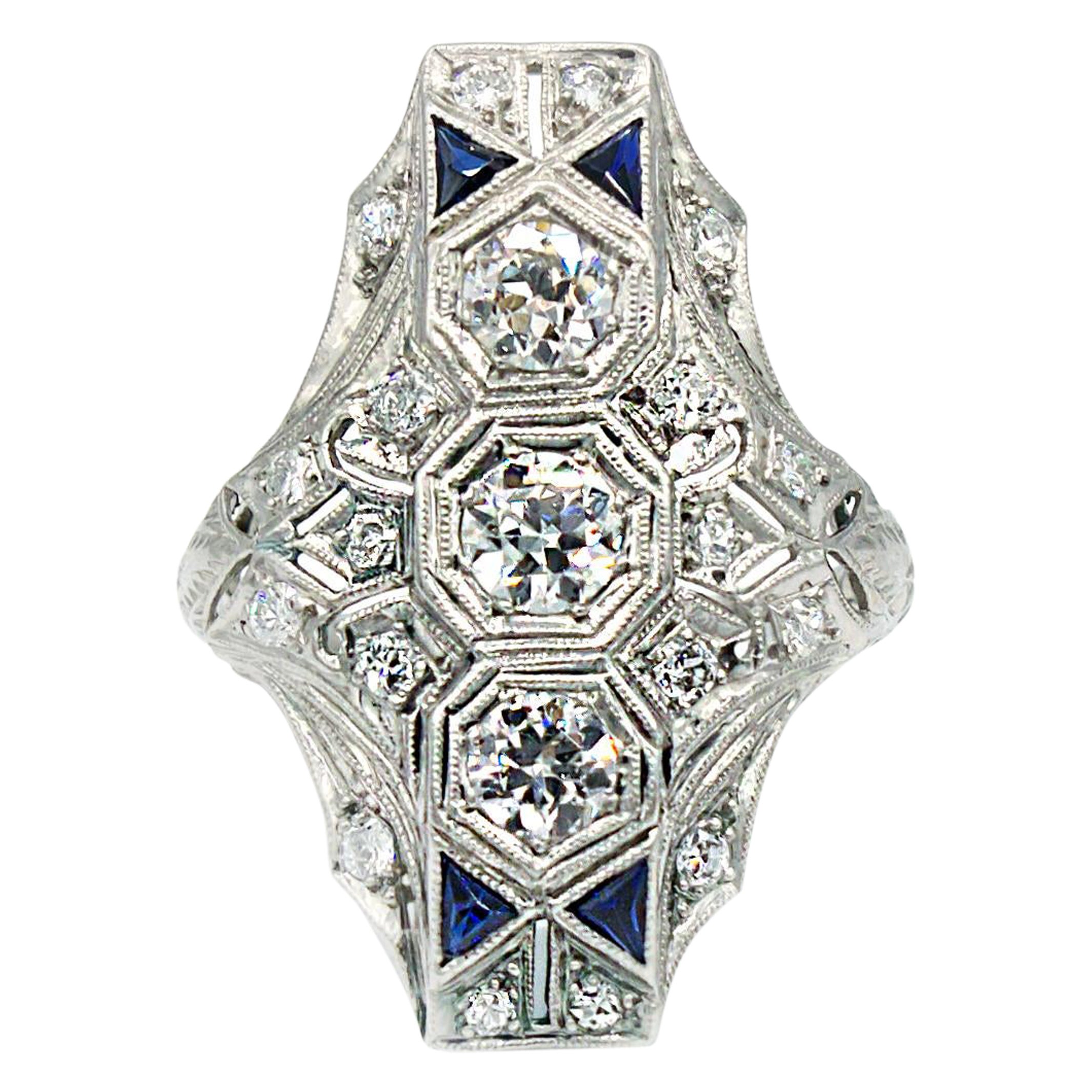 Edwardian Platinum 3 Stone Diamond and Sapphire North South Ring