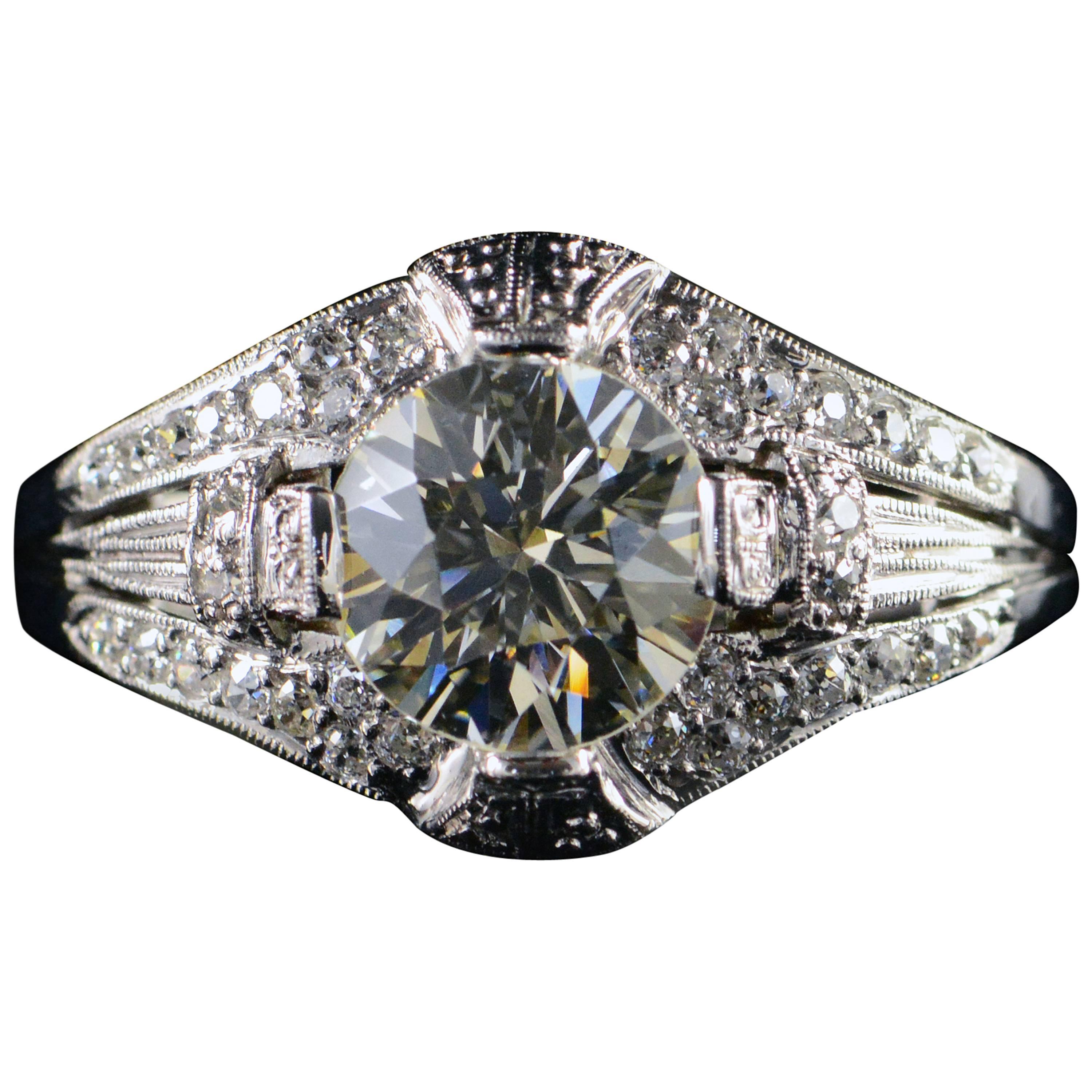 Art Deco Era 1.65 Carat Diamond Platinum Engagement Ring For Sale