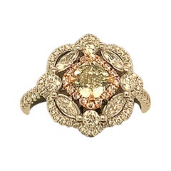 Green Diamond Ring with Halo of Pink