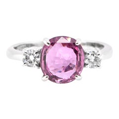 2.72 Carat Natural Purple Sapphire and Diamond Three Stone Ring Set in Platinum