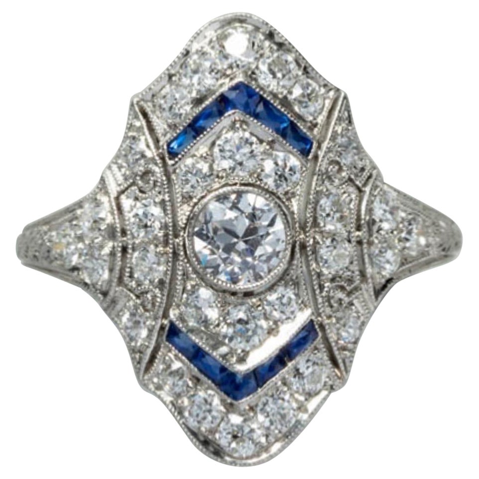 Platinum Ring with Diamonds and Sapphire