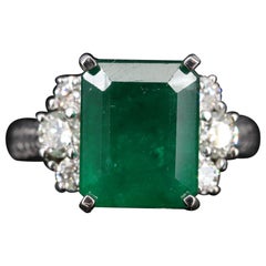 GIA Report Certified 4.81 Carat Emerald and Diamond White Gold Engagement Ring
