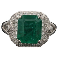 GIA Report Certified 4.06 Carat Emerald and Diamond White Gold Engagement Ring
