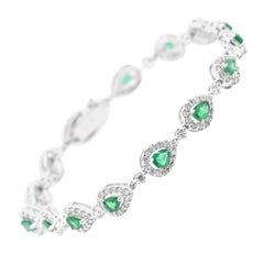 1.81 Carat Natural Pear-Cut Emeralds & Diamonds Tennis Bracelet Set in Platinum