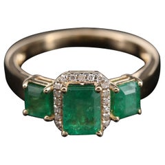 GIA Report Certified Emerald and Diamond Yellow Gold Three Stone Ring 