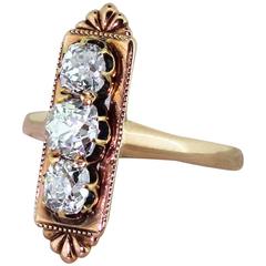 Art Deco 1.30 Carat Old Cut Diamond Rose Gold Vertical Three Stone Ring