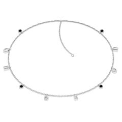 Ruben Manuel Designs “Winter” Necklace.  18K WG, VS white and black diamonds.