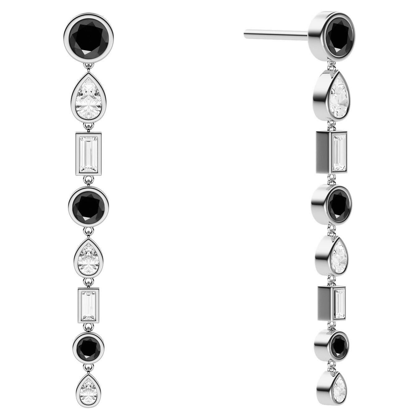 Ruben Manuel “Winter” Earrings.  VS white diamonds and black round diamonds.