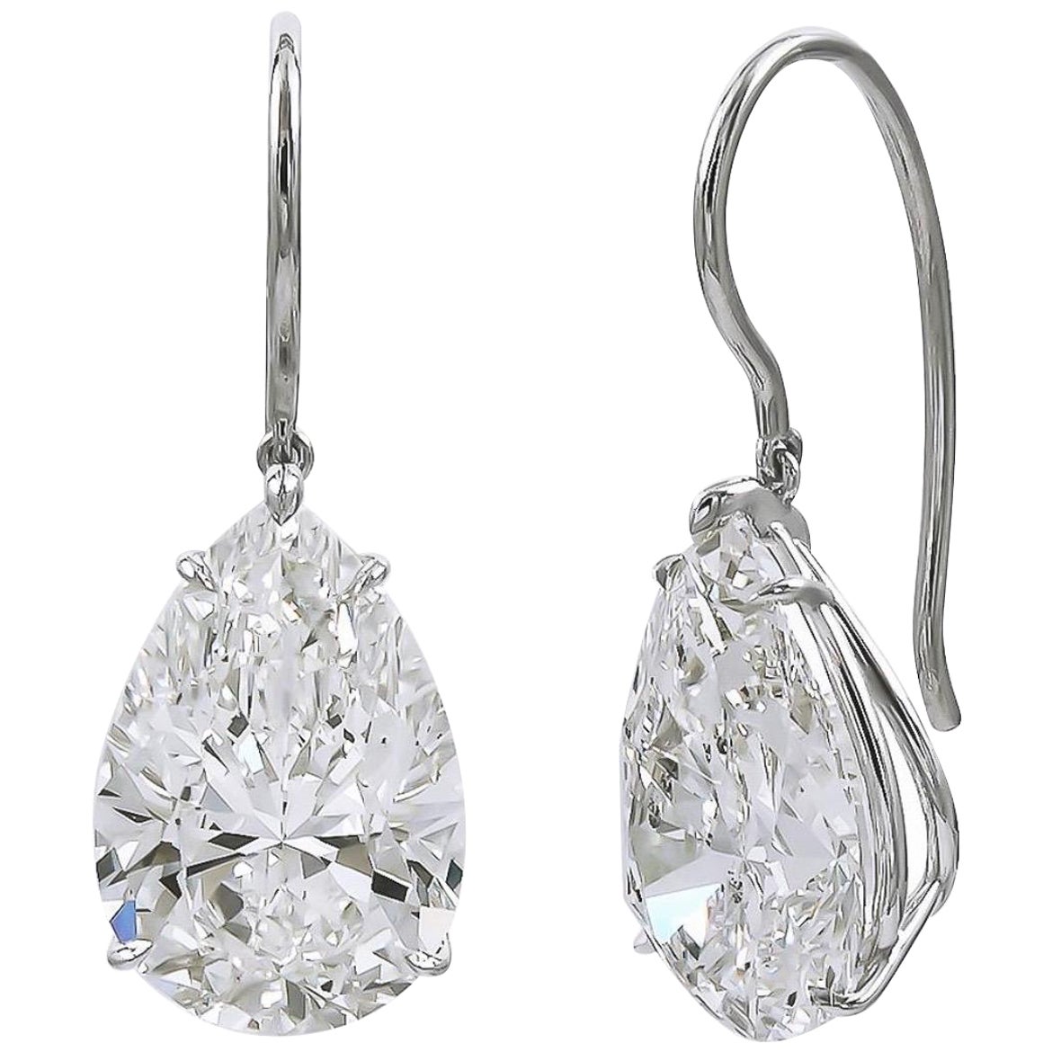 An Impressive and rare 10.33 Carat toatal weight matched pear shaped Drop earrings by ISSAC NUSSBAUM NEW YORK.
This beautiful pair of earrings feature rare pear shape diamonds set in hand made platinum. the perfectly cut diamonds weigh over 5 carats