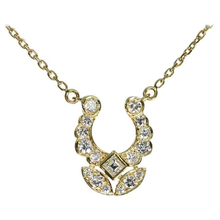 Cartier Halskette mit Hufeisen-Anhänger aus Gelbgold mit Diamanten im  Angebot bei 1stDibs