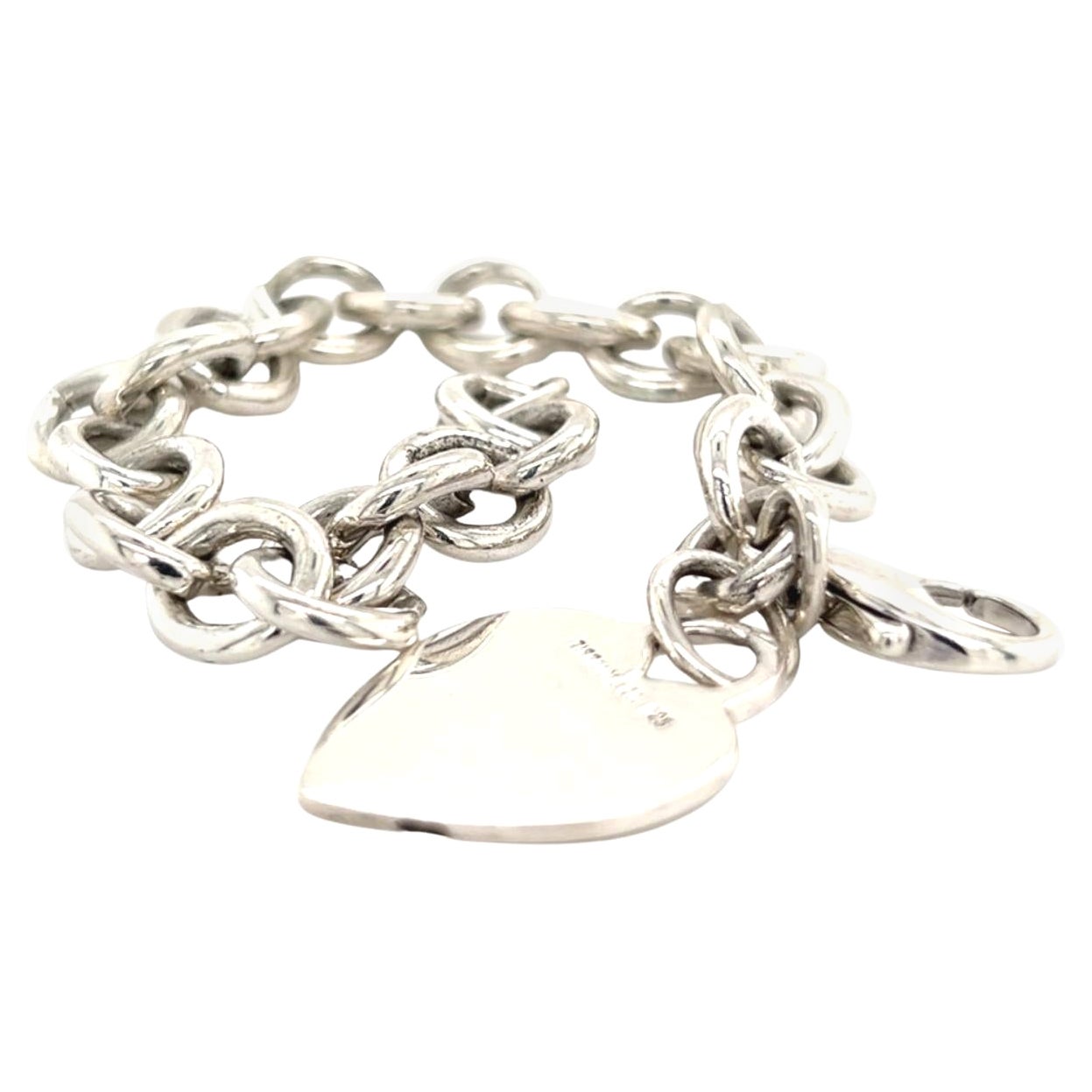 Tiffany and Co Estate Heart Charm Bracelet Sterling Silver 36 Grams For  Sale at 1stDibs | tiffany and co bracelet heart, 36 grams of silver price,  sterling silver heart charm bracelet