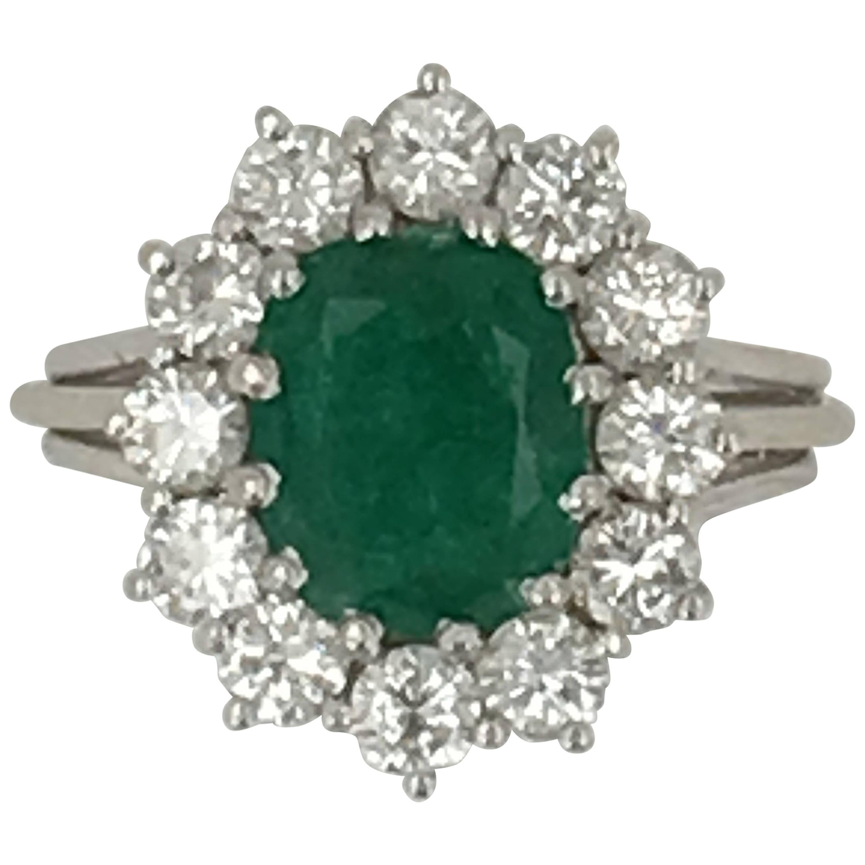 2.50 Carat Oval Cut Emerald Diamond Gold Cluster Ring For Sale
