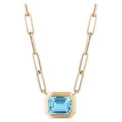 Goshwara East-West Blue Topaz Emerald Cut Bezel Set Pendant