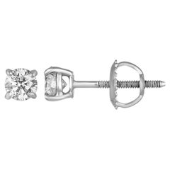 Boucles d'oreilles en or avec diamants de 0,60 carat