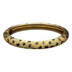 Fred Paris An ‘Ombre Feline’ Gold And Black Enamel Hinged Bangle Circa 1970s