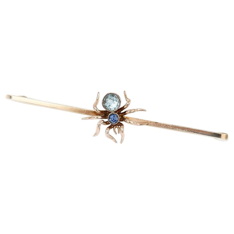 Early 20th Century 9ct Gold Sapphire and Topaz Spider Bar Brooch For Sale