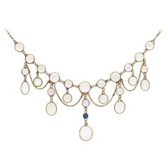 Collier feston édouardien en or 9 carats, pierre de lune et saphir, c. 1905