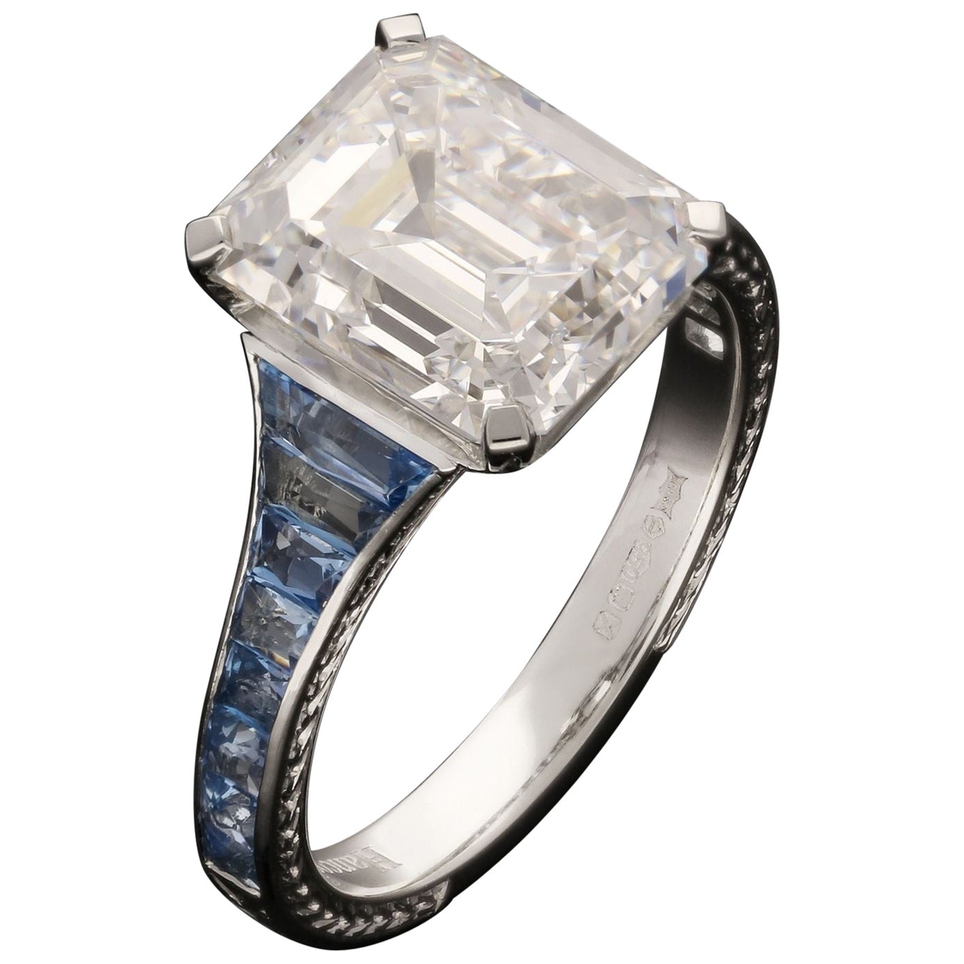 Hancocks 4.48ct Emerald Cut Diamond Ring with Aquamarine Shoulders in Platinum For Sale