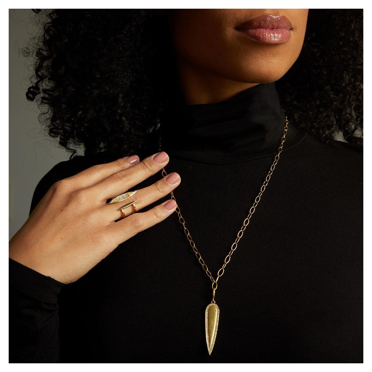 The Large Engravable Nifo is modeled after the classic whale tooth shape and features a Natural Diamond frame. This 18k yellow gold Pendant was inspired by one simple question,

