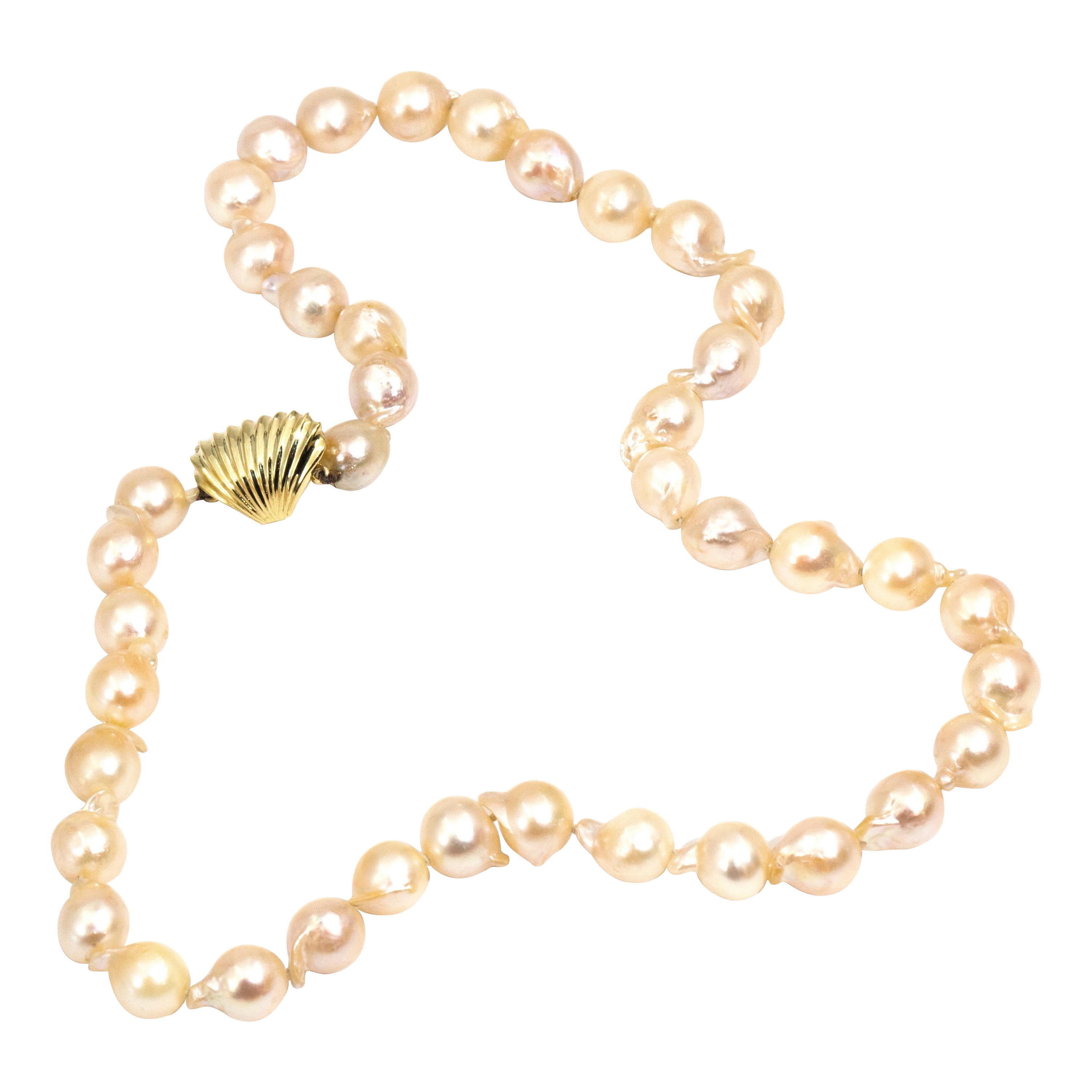 Circa 1980s Baroque Akoya Pearl Vintage 18 Carat Gold Seashell Clasp Necklace