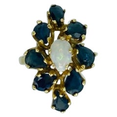 Retro 9.56 Carat Blue Sapphires and Opal Center Cluster Cocktail Ring 14k Gold