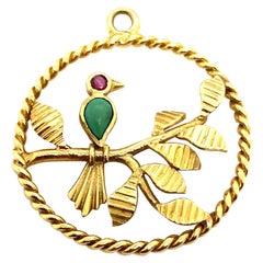 Vintage Van Cleef & Arpels Turquoise and Ruby Bird Circular Pendant 18 Karat Yellow Gold