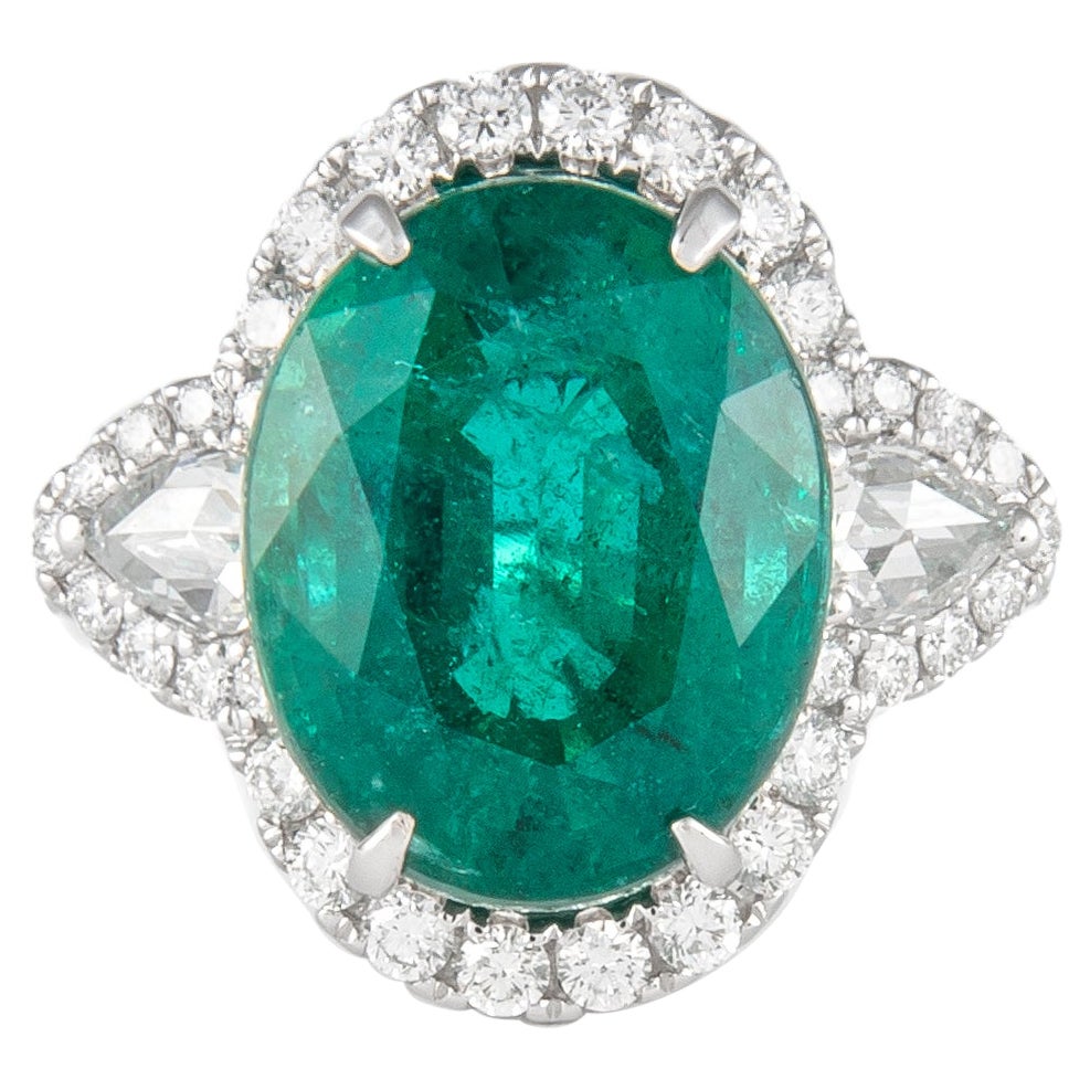 Alexander 8.50ct Oval Emerald with Diamond Three Stone Halo Ring 18 Karat Gold