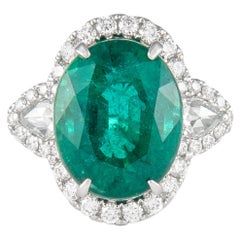 Antique Alexander 8.50ct Oval Emerald with Diamond Three Stone Halo Ring 18 Karat Gold