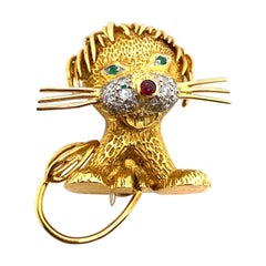 Vintage Kutchinsky 18 Karat Yellow Gold, Ruby, Emerald and Diamond Lion Brooch Pin