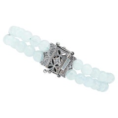 Bracelet Retrò en aigue-marine, diamants, or rose et argent